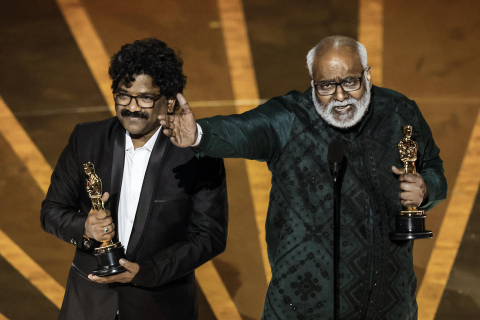 Image: Chandrabose and M. M. Keeravani accept the Best Original Song award for 'Naatu Naatu' from 