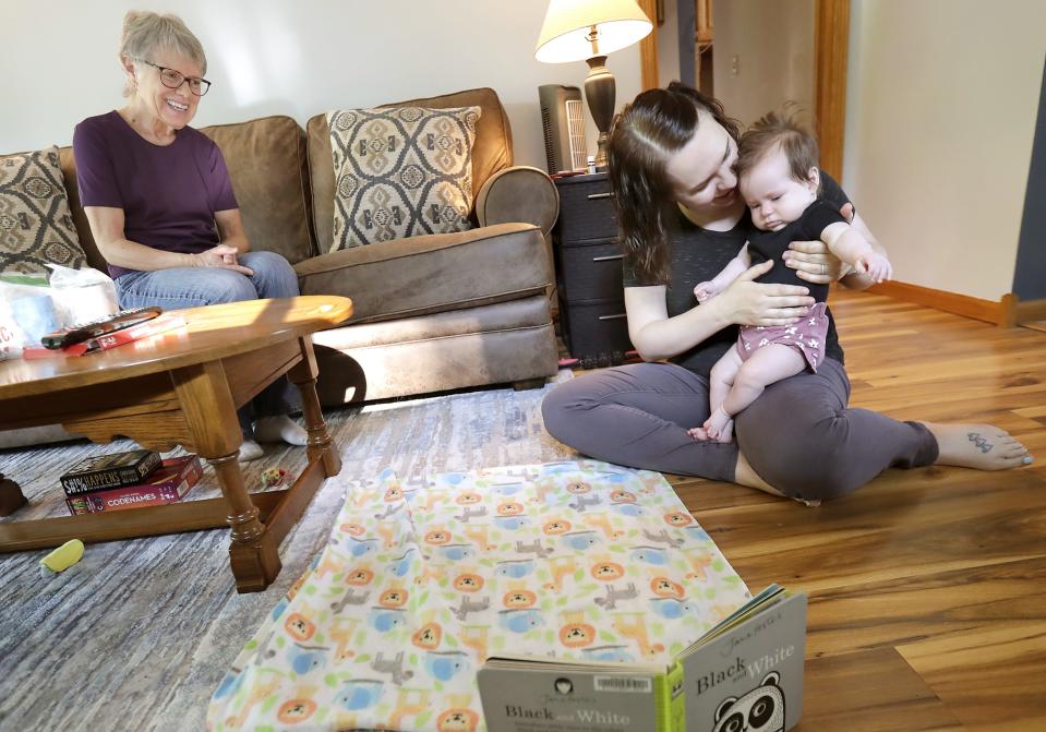 Carolyn Nelson, right, with her mother Gloria Mathews and her 5-month-old daughter, Emma on Tuesday, June 20, 2023 in Appleton, Wis. Due to a lack of childcare Carolyn and her husband rely on her mom to drive 2.5 hours to take care of Emma when she needs to work.
Wm. Glasheen USA TODAY NETWORK-Wisconsin