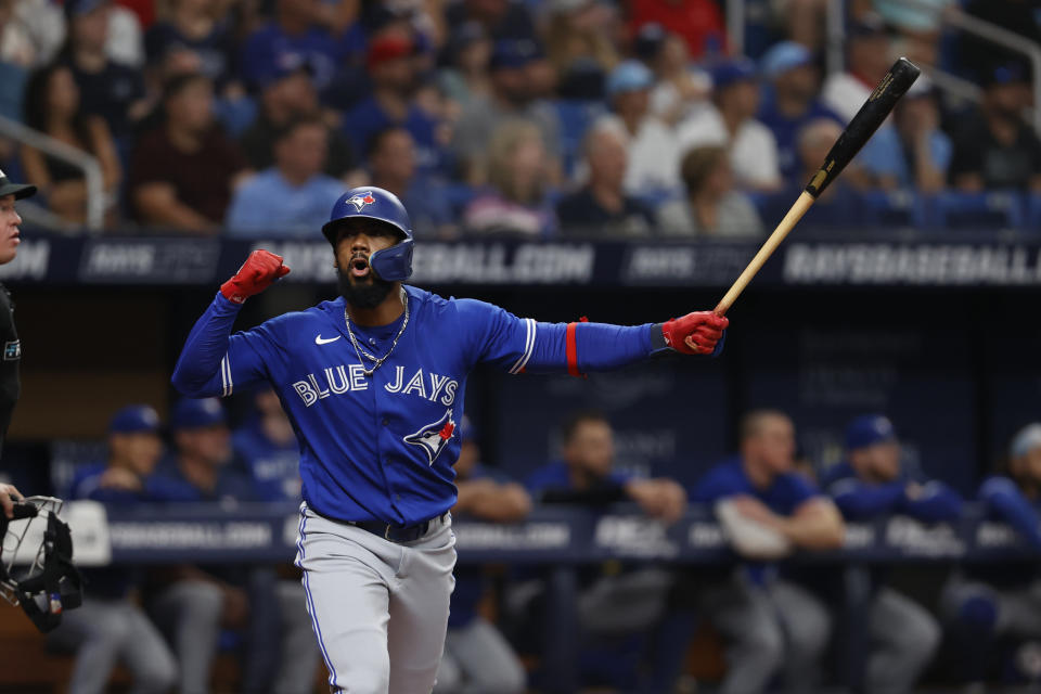 FILE - Then-Toronto Blue Jays' Teoscar Hernandez reacts while batting during a baseball game against the Tampa Bay Rays, Sept. 24, 2022, in St. Petersburg, Fla. Outfielder Teoscar Hernández went to arbitration with the Seattle Mariners and will set a record win or lose, and St. Louis Cardinals pitcher Génesis Cabrera also appeared before a panel on the final day of hearings this year. (AP Photo/Scott Audette, File)