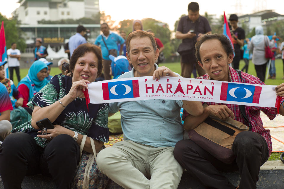 Supporters of Anwar Ibrahim who heads the People's Justice Party (PKR), hold a banner during a solidarity in Petaling Jaya, Malaysia on May 16, 2018. Anwar Ibrahim has been repleased from custody after receiving a pardon from the Malaysia's King Sultan Muhammad V. (Photo by Chris Jung/NurPhoto via Getty Images)