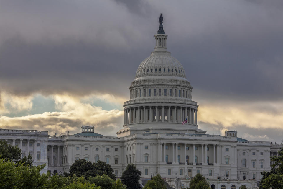 FILE - This Wednesday, Aug. 1, 2018, file photo shows the Capitol in Washington. As a potentially catastrophic hurricane heads for the Carolinas, Congress is moving to avert a legislative disaster that could lead to a partial government shutdown just weeks before the November midterm elections. (AP Photo/J. Scott Applewhite, File)