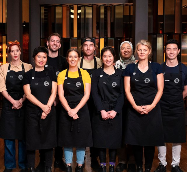 MasterChef contestants in black aprons