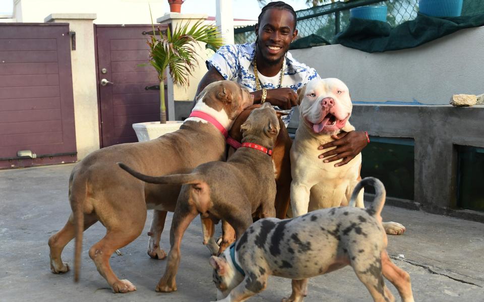 Jofra Archer of England at his home with his five dogs in Barbados before the second Test against West Indies at Kensington Oval on March 14, 2022 in Bridgetown, Barbados - Getty Images/Philip Brown