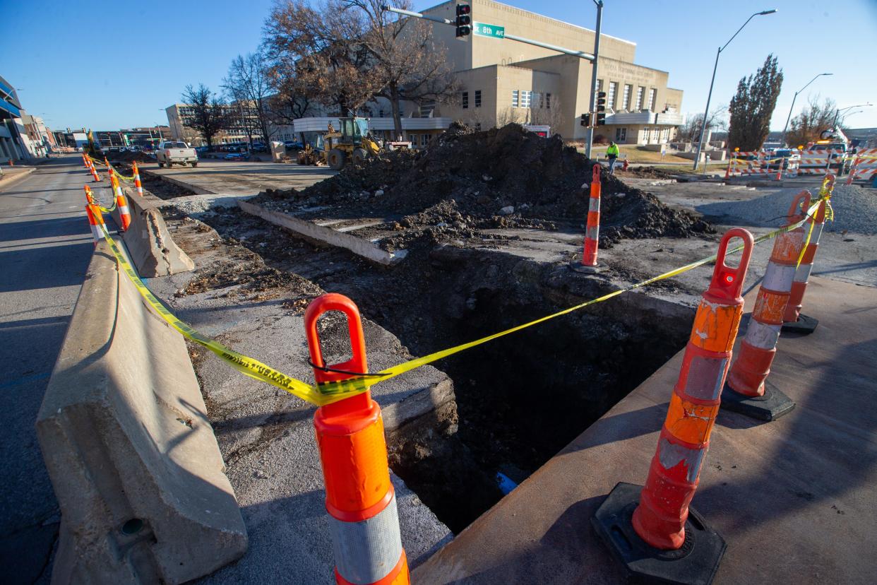 Repairs to a water main under Quincy Street between 7th and 8th continue Wednesday morning. Avoiding water main breaks is among reasons Topeka’s mayor and city council are being asked to vote next week to increase city utilities rates.