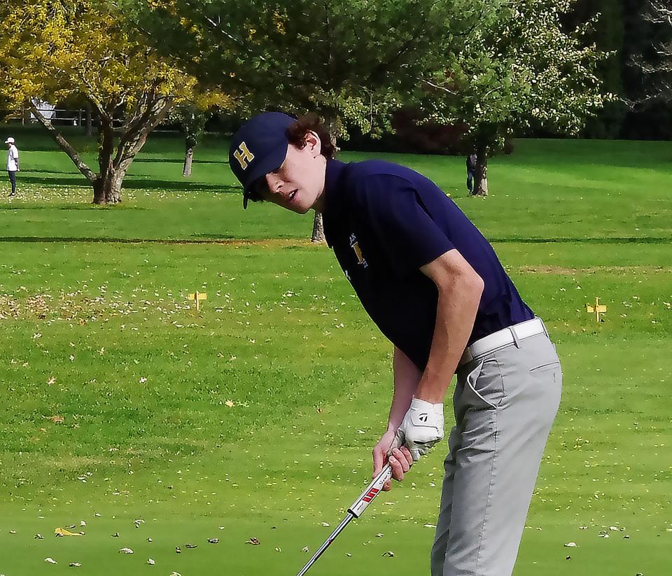 Chris Doherty of Hanover intensely watches his put sail to the side of 1st hole during the Div. 2 Golf playoffs at the Easton Country Club on Tuesday, Oct. 18, 2022.