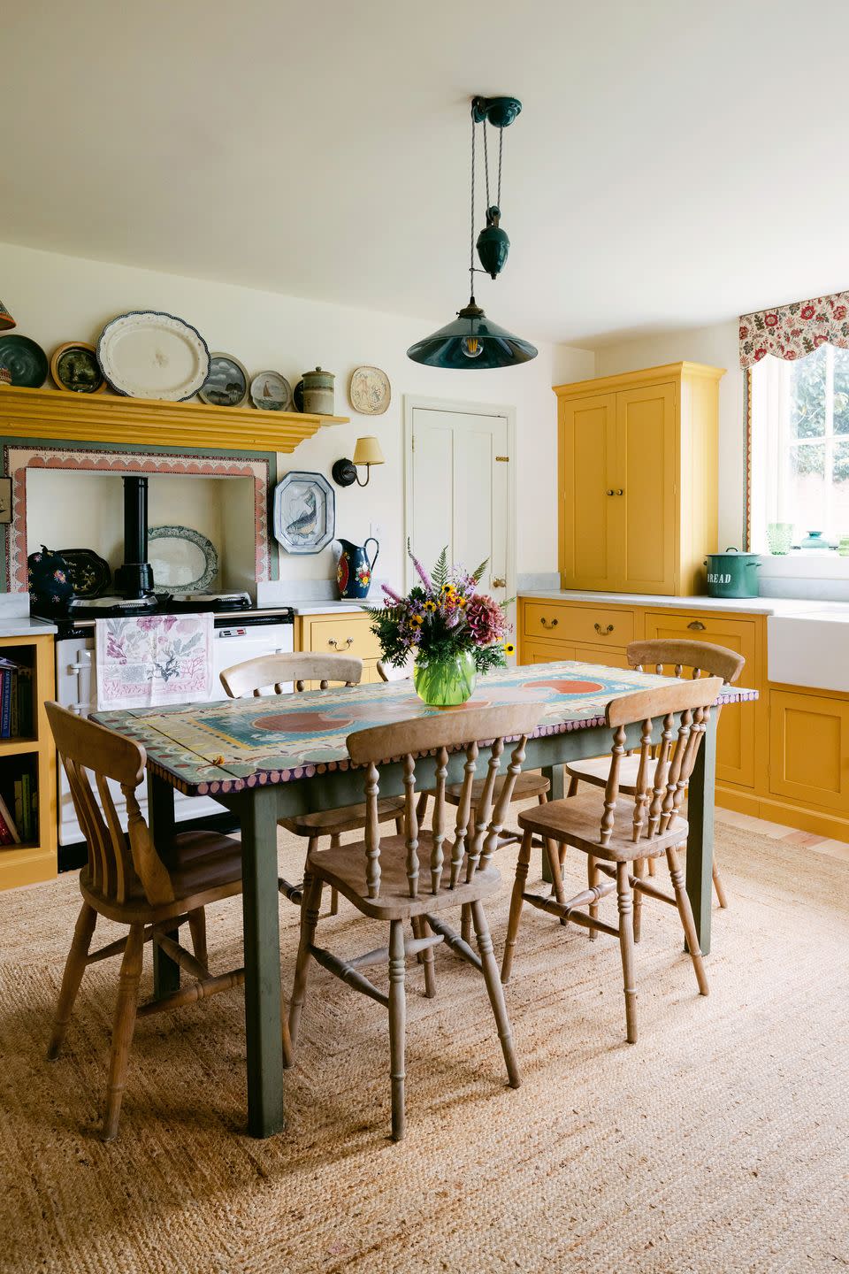 a dining room table with chairs