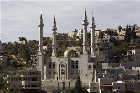 A new mosque with four minarets is seen in the Israeli-Arab village of Abu Ghosh, near Jerusalem November 22, 2013. REUTERS/Ronen Zvulun