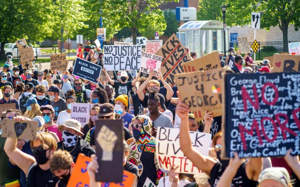 Protests have erupted across the US and the rest of the world in response to George Floyd's death - KEREM YUCEL / AFP