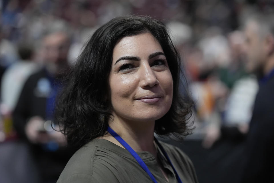 Brooke Zumas poses during first found of the PIAA High School Wrestling Championships in Hershey, Pa., Thursday, March 7, 2024. Zumas, a former wrestling coach, was active in the movement to get the girls wrestling sanctioned in Pennsylvania. (AP Photo/Matt Rourke)
