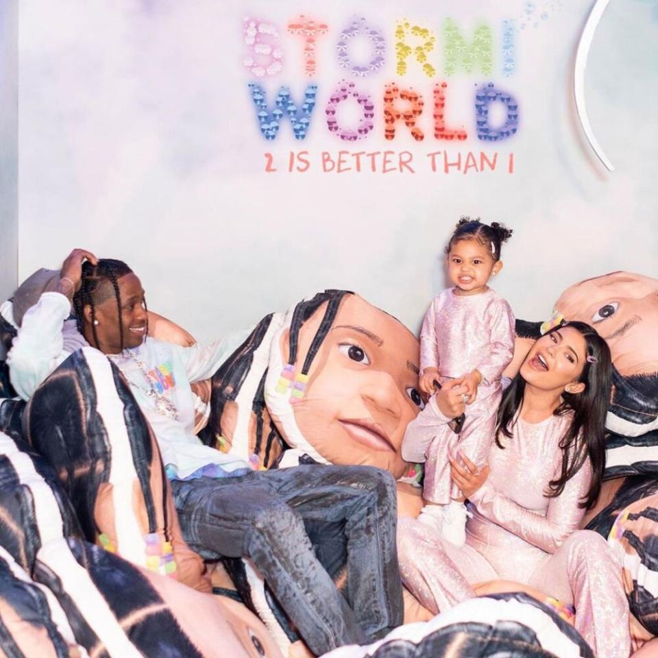 Travis Scott (L) and Kylie Jenner with daughter Stormi | Kylie Jenner/ Instagram