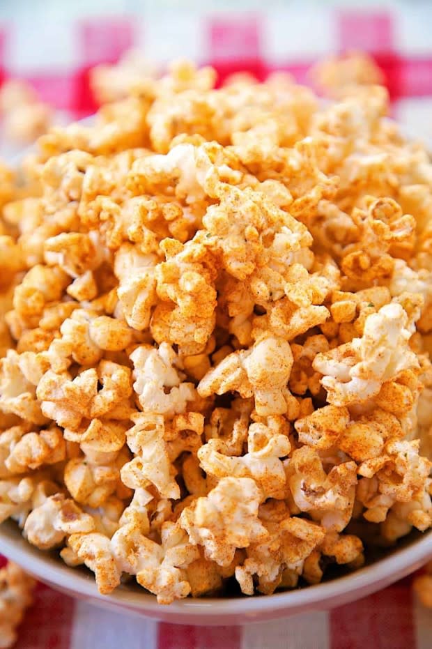 <p>Plain Chicken</p><p>You only need four ingredients and 10 minutes to have this flavorful snack ready to go.</p><p><strong>Get the recipe: <a href="https://www.plainchicken.com/bbq-ranch-popcorn/" rel="nofollow noopener" target="_blank" data-ylk="slk:BBQ Ranch Popcorn;elm:context_link;itc:0;sec:content-canvas" class="link ">BBQ Ranch Popcorn</a></strong></p>