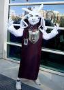 <p>This cosplayer came dressed to play as the goat-headed Toriel from the RPG <i><a href="http://undertale.wikia.com/wiki/Undertale" rel="nofollow noopener" target="_blank" data-ylk="slk:Undertale;elm:context_link;itc:0;sec:content-canvas" class="link ">Undertale</a></i>. <i>(Photo: Matt Cowan/Getty Images)</i><br></p>