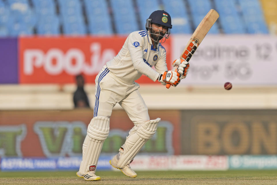 India's Ravindra Jadeja plays a shot on the first day of the third cricket test match between England and India in Rajkot, India, Thursday, Feb. 15, 2024. (AP Photo/Ajit Solanki)