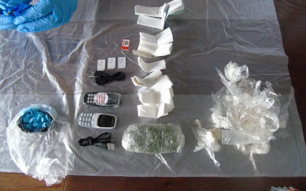 Prisoners have been smuggling items such as mobile phones and illegal substances into jails (pictured)  - PA