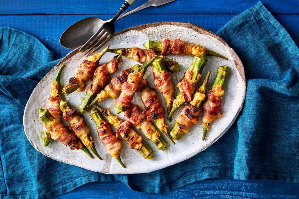 <p><strong>Recipe: </strong><a href="https://www.southernliving.com/recipes/stuffed-okra-poppers" rel="nofollow noopener" target="_blank" data-ylk="slk:Stuffed Okra Poppers;elm:context_link;itc:0;sec:content-canvas" class="link "><strong>Stuffed Okra Poppers</strong></a></p> <p>We put a Southern spin on jalapeno poppers with okra and a pimiento cheese-like filling. This recipe turned out to be the appetizer of the summer. </p>