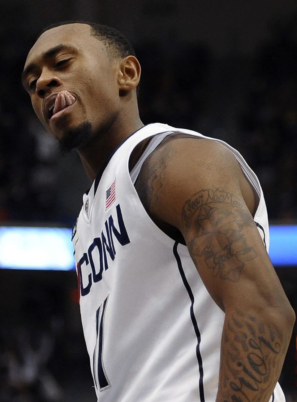 Connecticut's Ryan Boatright reacts after a basket during the second half of an NCAA college basketball game against Syracuse in Hartford, Conn., Wednesday, Feb. 13, 2013. Connecticut won 66-58. (AP Photo/Jessica Hill)