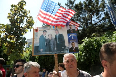 A U.S. flag is pictured during the 20th anniversary of the Deployment of NATO Troops in Kosovo, in Pristina