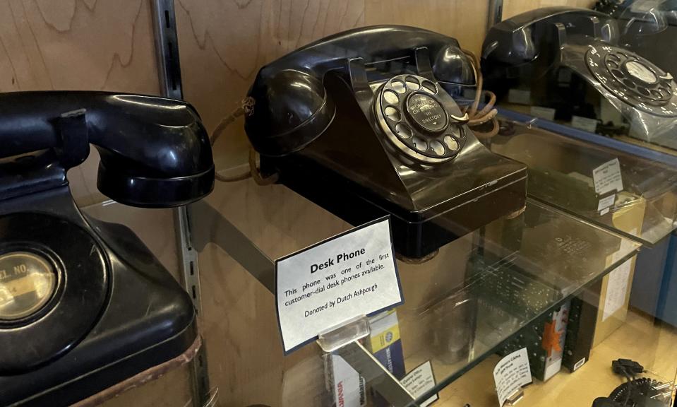 A collection of 1940s and 1950s desk phones on display at Pioneer Telephone Cooperative in Kingfisher.