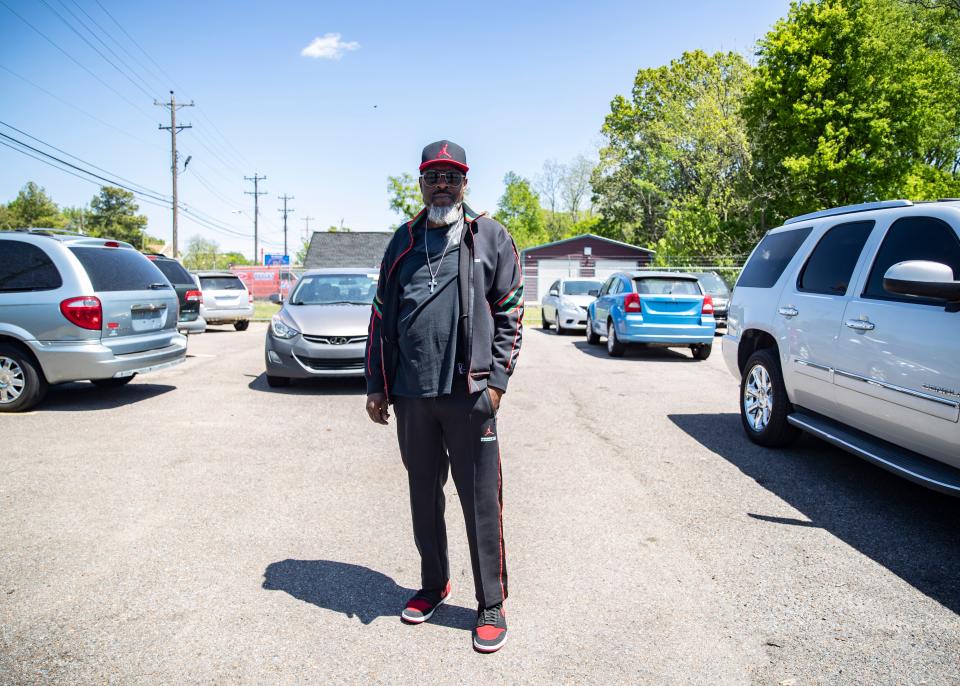 Marvin Coleman stands in his car lot ,Chelsea Auto Mart on Wednesday, April 22, 2021  in Memphis, Tenn. Coleman is formerly incarcerated individual who became a business owner in the Hyde Park area.