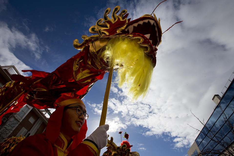 People from the Chinese community celebrate the Lunar New Year, the year of the Rooster, in Madrid, Spain Saturday Jan. 28, 2017. (AP Photo/Paul White)