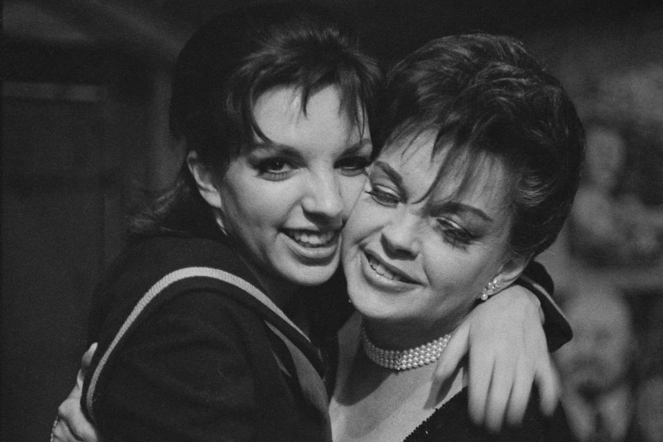 <p>Hulton Archive/Getty</p> Liza Minnelli and Judy Garland in 1965