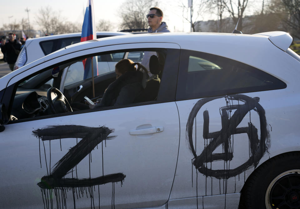 A sticker with a letter Z is seen on a car during a rally in support of Russia in Belgrade, Serbia, Sunday, March 13, 2022. Despite formally seeking EU membership, Serbia has refused to introduce international sanctions against its ally Russia. EU officials have repeatedly warned Serbia that it will have to align itself with the bloc's foreign policies if it wants to join. (AP Photo/Darko Vojinovic)