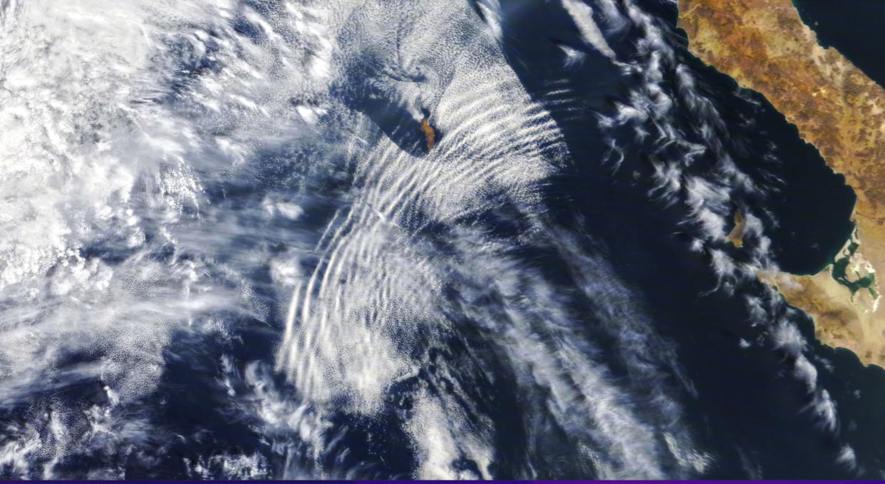  Buoyancy waves often leave "ripples" in clouds like those seen over the Pacific Ocean in this image from NASA’s Terra satellite captured on Oct. 4, 2020. 