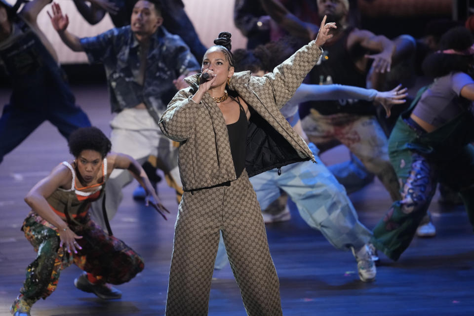 Alicia Keys performs alongside members of the company of "Hell's Kitchen" during the 77th Tony Awards on Sunday, June 16, 2024, in New York. (Photo by Charles Sykes/Invision/AP)