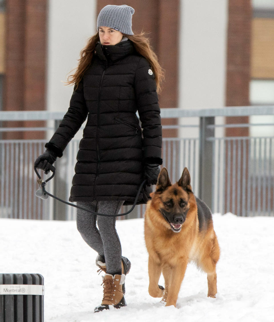 <p>Shailene Woodley bundles up in a winter coat, boots and a beanie to walk her dog in Montreal on Sunday.</p>