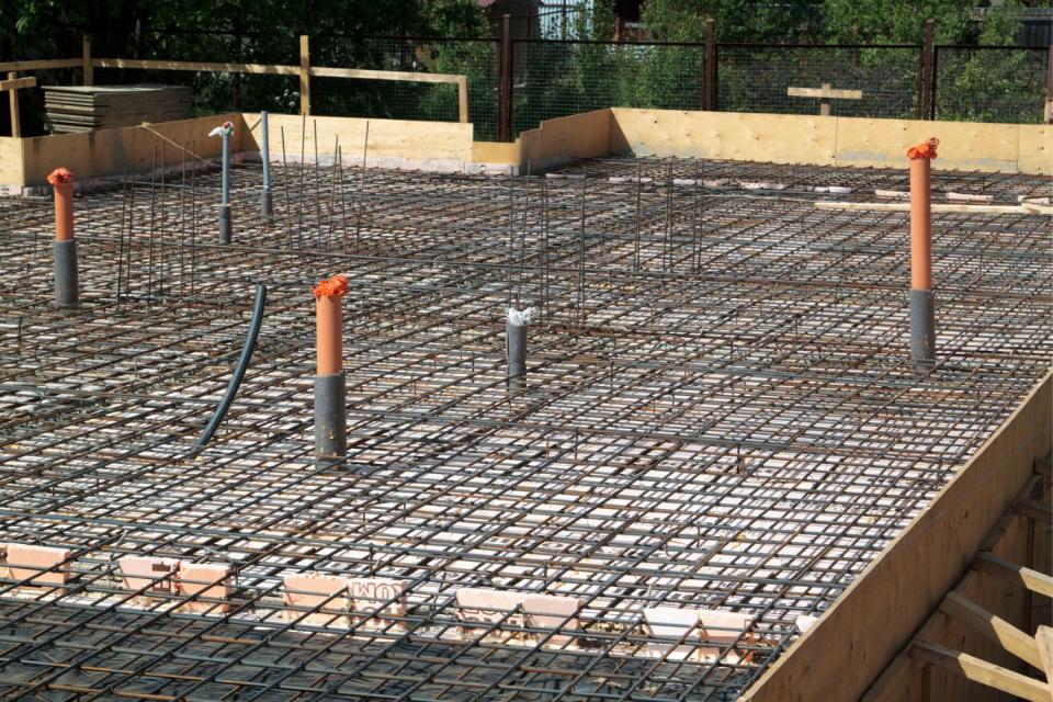 A close up of a foundation in the process of being built.