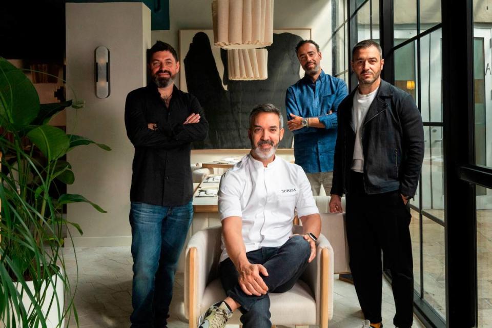 Chef Henrique Sá Pessoa (seated) with Alan Drummond, Sven Vogtland and Jourdan Binder from Sault Hospitality.