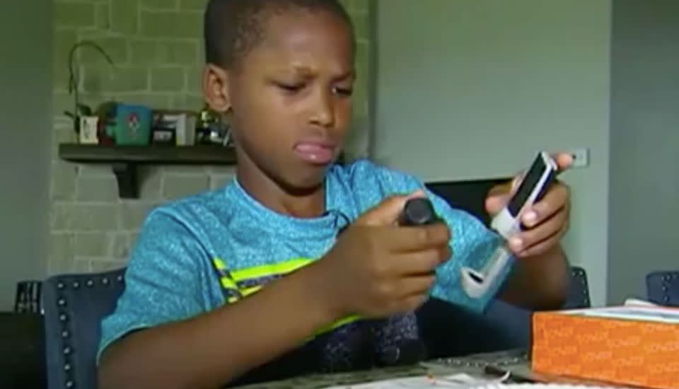 Bishop Curry, 11, invented a hot car warning alarm after hearing about a baby who had died in a hot car. Source: 7 News
