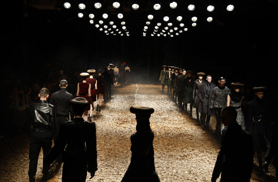 Models display creations by designer McQ Alexander McQueen during a fashion show at London Fashion Week, Monday, Feb. 20, 2012. (AP Photo/Kirsty Wigglesworth)