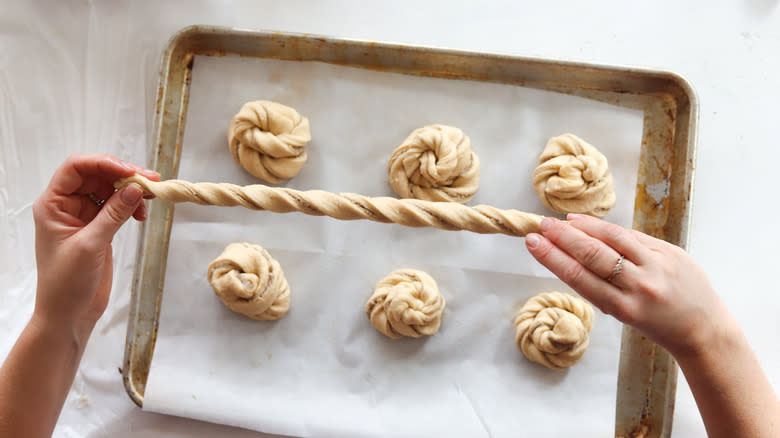 dough strips twisted on baking sheet
