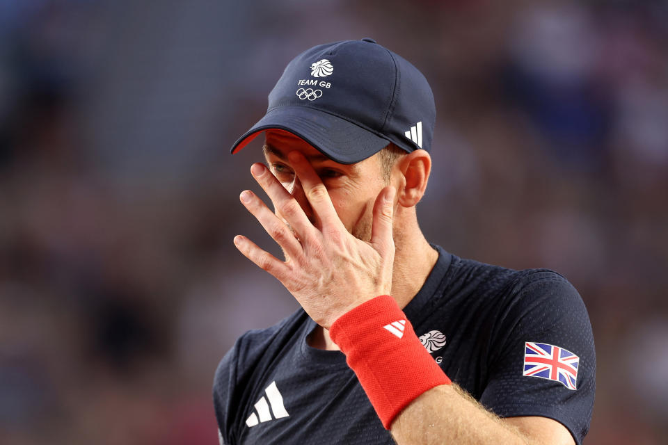 PARIS, FRANCE - AUGUST 01: Andy Murray of Team Great Britain reacts with partner (out of frame) Daniel Evans of Team Great Britain against Tommy Paul of Team USA and Taylor Fritz of Team USA during the Men's Doubles Quarterfinal match on day six of the Paris 2024 Olympic Games at Roland Garros on August 01, 2024 in Paris, France. (Photo by Julian Finney/Getty Images)