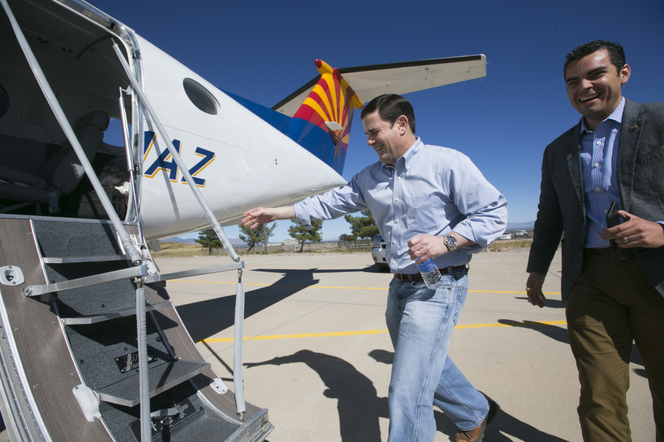 Juan Ciscoman (right) is a longtime aide to Gov. Doug Ducey (both seen here in 2015).