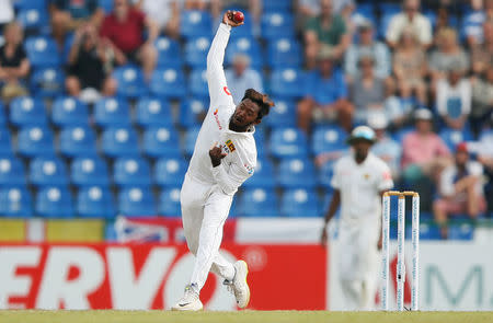 Cricket - England v Sri Lanka, Second Test - Pallekele, Sri Lanka - November 14, 2018. Sri Lanka's Akila Dananjaya bowls. REUTERS/Dinuka Liyanawatte