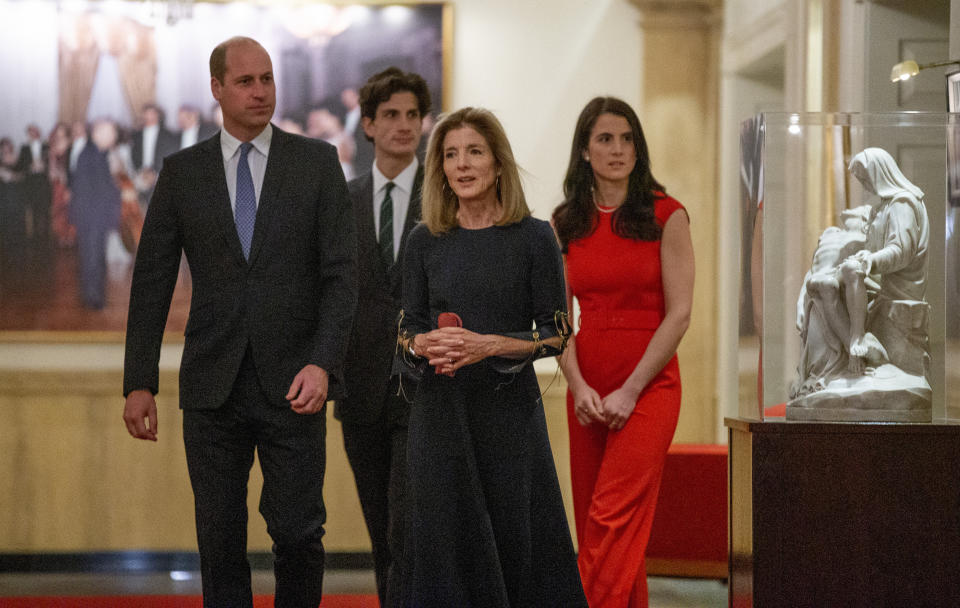 Britain's Prince William and U.S. Ambassador to Australia Caroline Kennedy, daughter of President Kennedy, along with her children John and Tatiana Schlossberg tour the John F. Kennedy Presidential Library, Friday, Dec. 2, 2022, in Boston. (Matt Stone/The Boston Herald via AP, Pool)