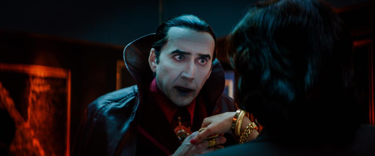 Nicolas Cage as Dracula in a cape