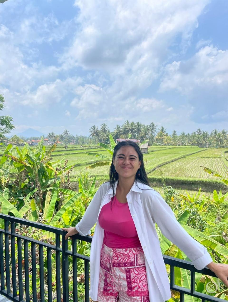 Mariana Kobayashi in front of rice fields