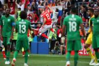 <p>Goal scorer Lury Gazinski of Russia celebrates the host nation’s opener in Moscow. (Getty) </p>