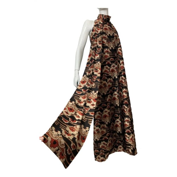 <p>Vintage Silk Maxi Dress, $419, <a href="https://us.vestiairecollective.com/women-clothing/dresses/non-signe-unsigned/brown-silk-non-signe-unsigned-dress-18140125.shtml" rel="nofollow noopener" target="_blank" data-ylk="slk:available here;elm:context_link;itc:0;sec:content-canvas" class="link ">available here</a> (size UK 8)</p>