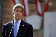 U.S. Secretary of State John Kerry delivers a statement on Cuba outside the hotel where the Iran nuclear talks meetings are being held in Vienna, Austria, July 1, 2015. U.S. President Barack Obama said on Wednesday the U.S. has agreed to the historic step of re-establishing diplomatic relations with Cuba, and will raise its flag over a U.S. Embassy in Havana this summer. REUTERS/Carlos Barria