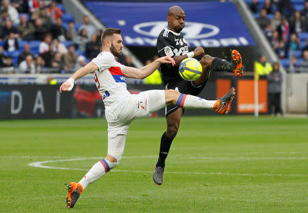 Soccer Football - Ligue 1 - Olympique Lyonnais vs Amiens SC - Groupama Stadium, Lyon, France - April 14, 2018 Lyon's Lucas Tousart in action with Amiens' Gael Kakuta REUTERS/Emmanuel Foudrot