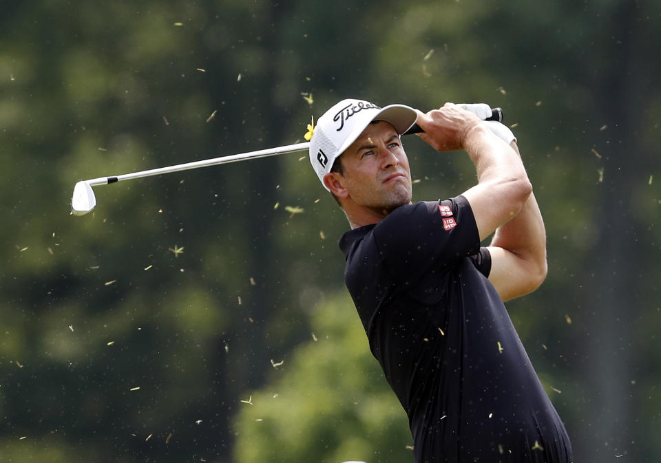 Adam Scott, of Australia, tees off on the third hole during the final round of the PGA Championship golf tournament at Bellerive Country Club, Sunday, Aug. 12, 2018, in St. Louis. (AP Photo/Jeff Roberson)