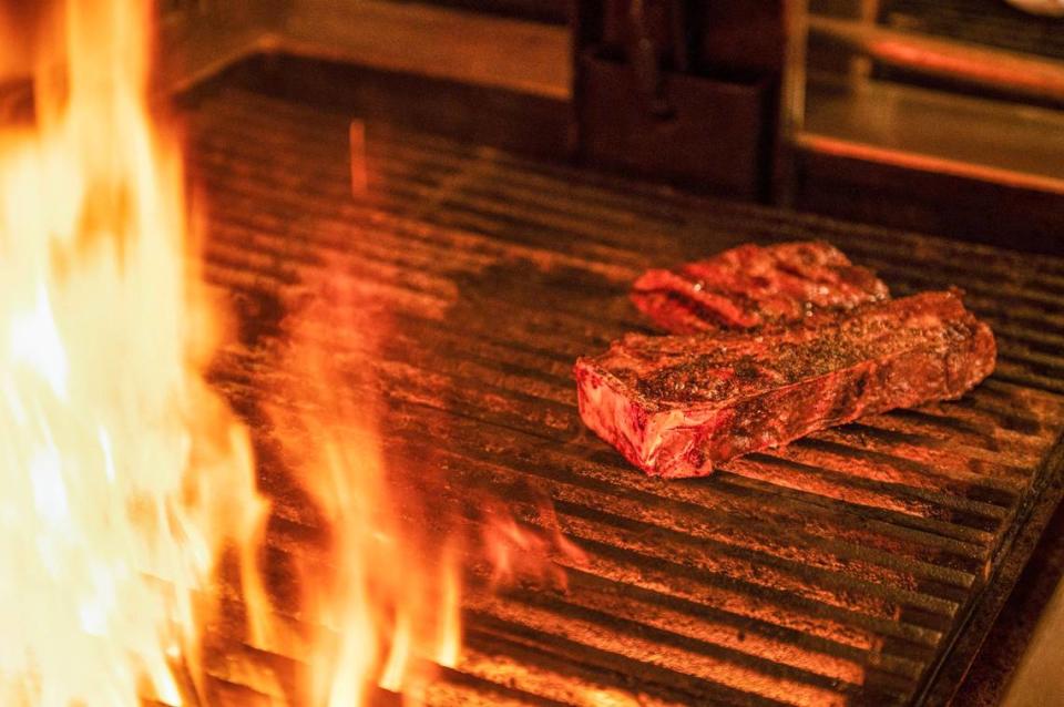 The Golden Ox grills its steaks over an open fire of oak and pecan wood.