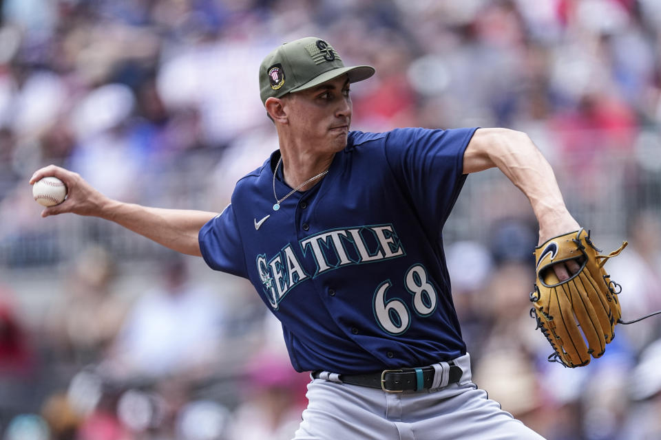 Seattle Mariners starting pitcher George Kirby (68) works against the Atlanta Braves during the first inning of a baseball game, Sunday, May 21, 2023, in Atlanta. (AP Photo/John Bazemore)