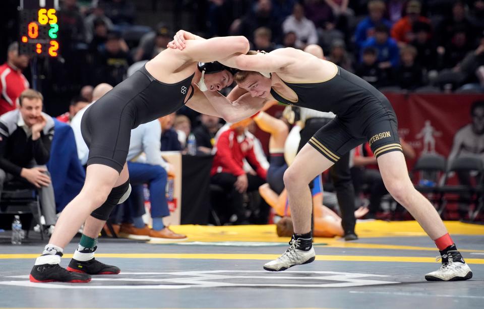 Watterson's Michael Boyle, right, competes against St. Paris Graham's Bryce Kohler in the 165-pound state final in Division II.