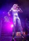 <b>Rita Ora's Emilio Pucci Radioactive tour wardrobe </b><br><br>Rita's outfit was all silver including a pair of metallic, lace-up boots.<br><br>© WENN