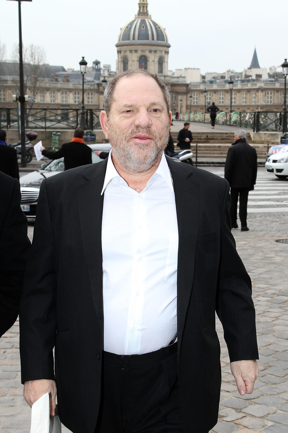 PARIS, FRANCE - MARCH 07:  Producer Harvey Weinstein arrives for the Louis Vuitton Ready-To-Wear Fall/Winter 2012 show as part of Paris Fashion Week on March 7, 2012 in Paris, France.  (Photo by Marc Piasecki/WireImage)